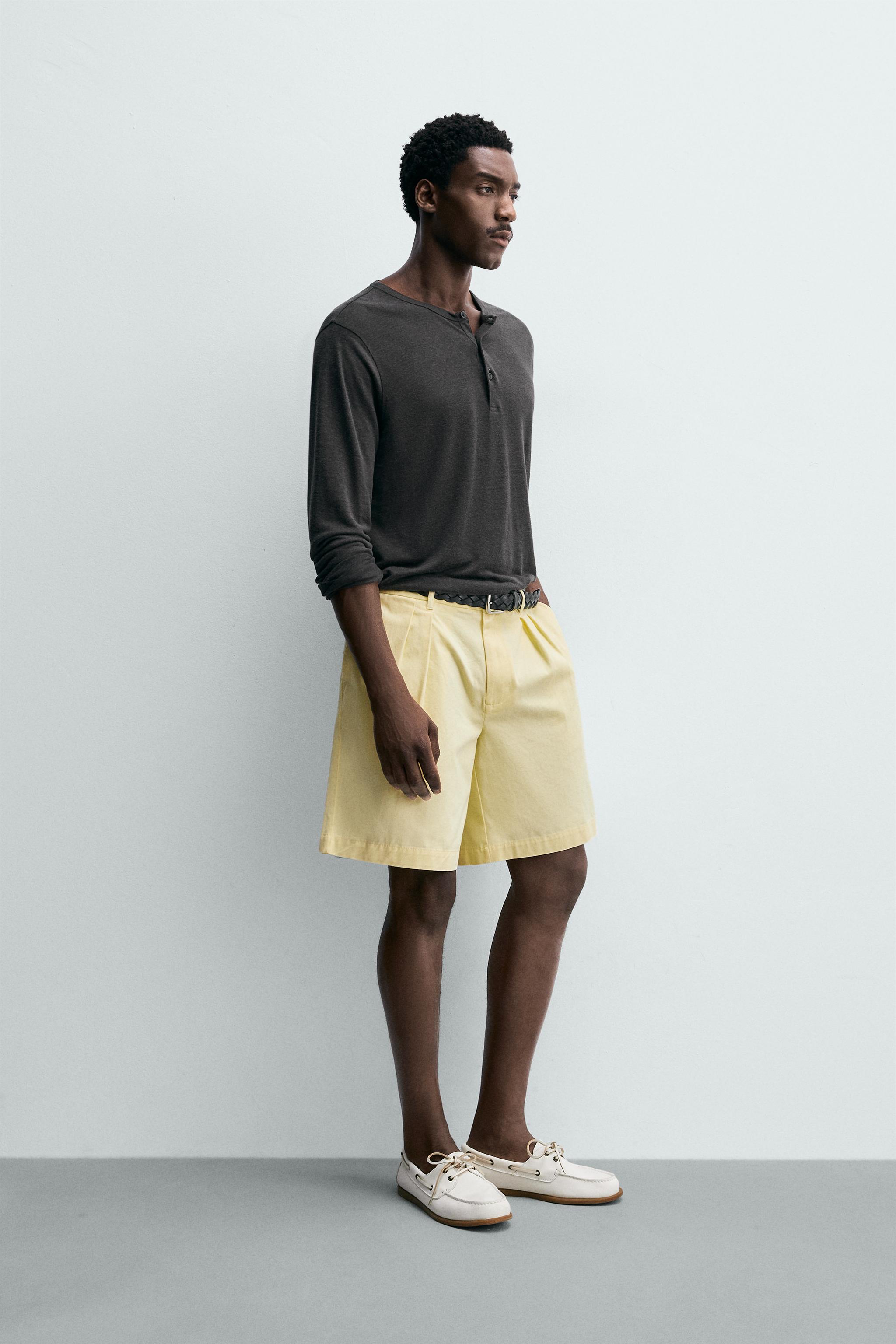 RELAXED FIT PLEATED SHORTS
